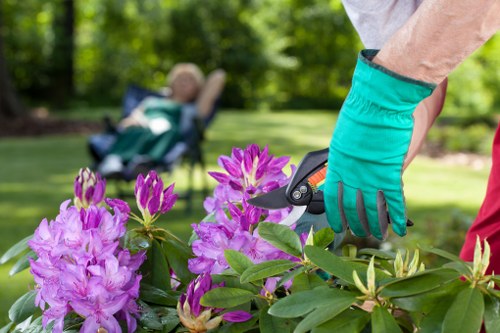 On-site composting and mulching operations in a sustainable gardening area